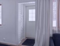 a shower curtain next to a window