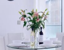 a vase of flowers on a table