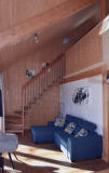 a room filled with furniture and a fireplace a room filled with furniture and a fireplace