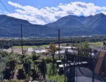 a view of a large mountain in the background