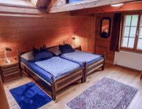 a bedroom with a wooden table