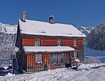 a house covered in snow
