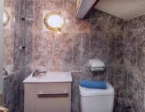 bathroom, indoor, wall, toilet, interior, plumbing fixture