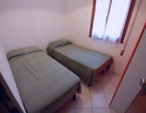 a double bed in a small room