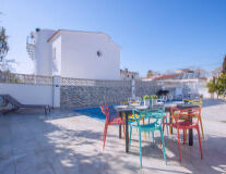 sky, outdoor, furniture, table, ground, chair, house