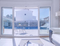 a view of a living room with a large window