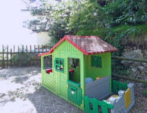 a small house in a garden