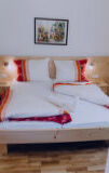 bed, pillow, couch, indoor, curtain, sofa bed, studio couch, bed sheet, bedding, cushion