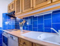 a kitchen with a blue sink