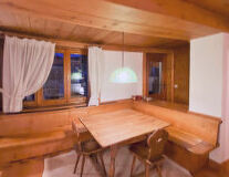 a room with a wooden table