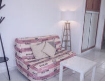 furniture, indoor, wall, floor, couch, pillow, studio couch, sofa bed