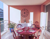 table, clock, wall, floor, indoor, vase, chair, coffee table, kitchen & dining room table, house, ceiling