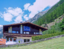 a house with a mountain in the background a house with a mountain in the background