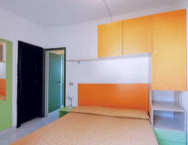 wall, indoor, ceiling, bed, floor, furniture, cabinetry, house, drawer, chest of drawers, yellow, orange