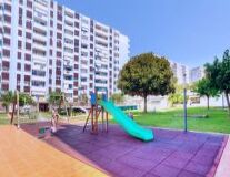 playground, outdoor, tree, green, building