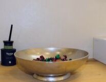 a bowl of food sitting on a counter