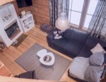furniture, indoor, table, couch, vase, floor, coffee table, house