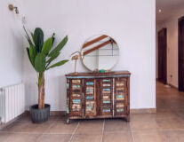 wall, floor, indoor, vase, houseplant, drawer
