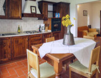 a kitchen with a dining table