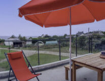 sky, outdoor, tent, umbrella, ground, furniture, table, chair, shade, orange