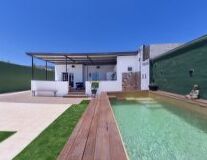 sky, grass, outdoor, swimming pool, house