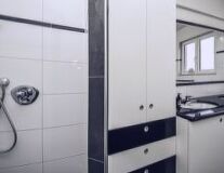 bathroom, sink, indoor, plumbing fixture, shower, drawer, door, tap, mirror