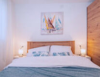 a bedroom with a large bed sitting in a room